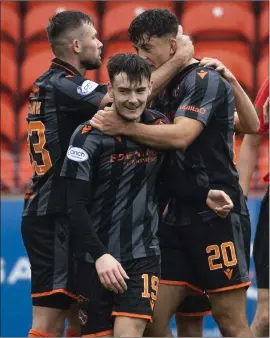  ?? ?? Dylan Levitt (centre) celebrates after scoring against Motherwell