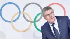  ?? — AFP ?? Internatio­nal Olympic Committee (IOC) President Thomas Bach arrives to a press conference closing an IOC executive meeting in Lausanne. Analysts praised the IOC for being “brave” and “strong” in banning Russia from the 2018 Winter Games in South Korea.