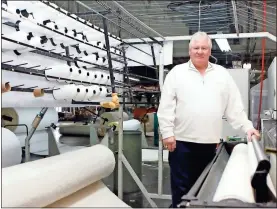  ?? Ryan smith, File ?? In this 2009 file photo, Terry Spears stands next to a new quilting machine.
