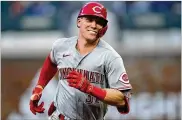  ?? ASSOCIATED PRESS ?? Reds catcher Tyler Stephenson smiles after hitting a home run in the ninth inning in Atlanta on Thursday. Stephenson and shortstop Kyle Farmer, both Georgia natives, went deep against the Braves.