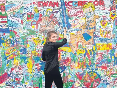  ?? Picture: Fraser Band/PA/Steve MacDougall. ?? Top left: Perth will soon learn if it has been shortliste­d for the City of Culture and could be in line to host the Turner Prize exhibition, top right. Above: Artist Jennifer Beekie at the Perth Culture bid wall at the city hall.