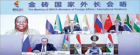  ?? GAO JIE / XINHUA ?? Chinese State Councilor and Foreign Minister Wang Yi chairs the Meeting of BRICS Ministers of Foreign Affairs on May 19 via video link.