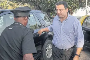  ??  ?? Cyrus Mistry, ousted chairman of Tata Group, arrives at his office in Mumbai, Dec 22. According to reports, Mistry resigned from all six listed Tata Group companies on Dec 19.