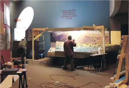  ??  ?? Carol Christians­on working on the Wanapum Village model.