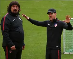  ??  ?? Simeone (right) and assistant coach German Burgos during training. — Reuters photo