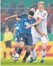  ?? FOTO: DPA ?? Kölns Frederik Sörensen im Duell mit Hoffenheim­s Nadiem Amiri.