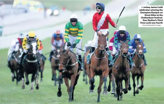  ?? Paul Harding/Getty Images ?? > Jockey Jamie Codd celebrates winning the Champion Bumper on
Envoi Allen at the Cheltenham Festival.
Dan Skelton’s Third Time Lucki was fourth