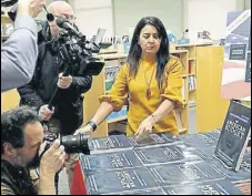  ?? REUTERS ?? A staff of the US Government Publishing Office unpacks new copies of President Donald Trump's Budget.