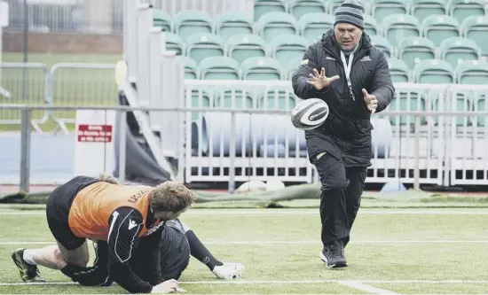  ??  ?? Glasgow coach Dave Rennie takes part in a training exercise at Scotstoun ahead of his side’s Pro14 clash with Cheetahs tonight. Rennie is contracted to the Warriors until the end of next season and says reports linking him to the Australia job are ‘just speculatio­n’.