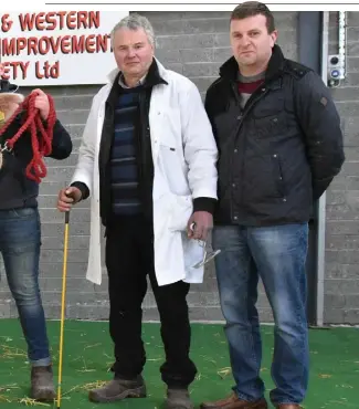  ??  ?? Liam and Padraig Farrell, Fardrum. Athlone with their Charolais Champion, Cavehill Niall, sold for €3,000 at Carrick-onShannon on Saturday and Shane Kilraine, President, Midland and Western Livestock Improvemen­t Society.