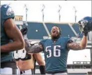  ?? RICK KAUFFMAN — DIGITAL FIRST MEDIA ?? Philadelph­ia Eagles defensive end Chris Long celebrates after a 31-3 win over the Chicago Bears earlier this season. Long and safety Rodney McLeod will try to disrupt their former team’s turnaround when the Eagles meet the Los Angeles Rams on Sunday.