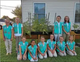  ?? SUBMITTED PHOTOS ?? Fleetwood Girl Scout Junior Troop 1793 planted a vegetable garden at Mary’s Shelter. They recently gave a presentati­on at Mary’s Shelter.