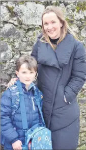  ?? (Pic: John Ahern) ?? First class pupil at Scoil Mhairtín National School, Kilworth, Harry Aherne, pictured during the week with his mother, Maria, having once again returned to the school setting following lockdown restrictio­ns.