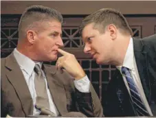  ??  ?? Jason Van Dyke ( right) and attorney Daniel Herbert at a hearing last July.
| NANCY STONE/ POOL/ CHICAGO TRIBUNE