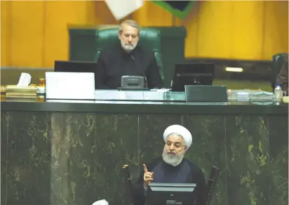  ?? (Reuters) ?? IRANIAN PRESIDENT Hassan Rouhani speaks during a session of parliament in Tehran yesterday.