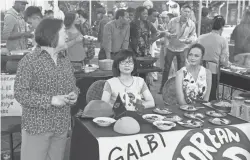  ??  ?? Mrs. Kim ( Emily Kuroda, left), Lane ( Keiko Agena) and Rory ( Bledel) serve up that small- town nostalgia.