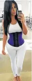  ??  ?? MRS WEST: Kim Kardashian shows off her waist trainer while at the gym