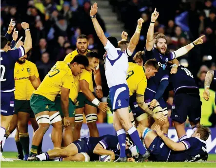  ?? PICTURE: Getty Images ?? Pace and precision: Stuart McInally touches down for Scotland’s eighth try