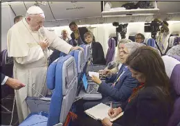  ?? EPA ?? Pope Francis speaks to journalist­s aboard his flight to Italy at the end of his apostolic journey to South America on Monday.