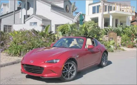  ??  ?? The Mazda MX-5 (nee Miata) is just about the most fun you can have for the buck.