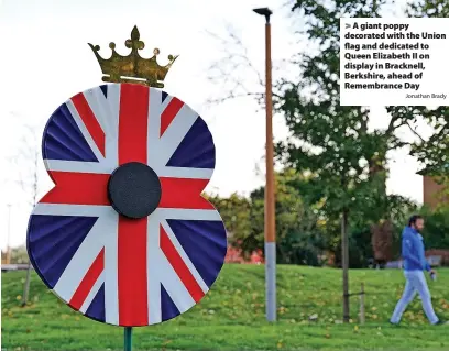  ?? Jonathan Brady ?? A giant poppy decorated with the Union flag and dedicated to Queen Elizabeth II on display in Bracknell, Berkshire, ahead of Remembranc­e Day