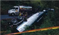  ?? CALIFORNIA DEPARTMENT OF FISH AND GAME ?? A tanker truck owned by VSS Internatio­nal of Sacramento rolled into a creek off Alpine Road east of La Honda on Sept. 30, 2019, spilling roughly 1,000gallons of asphalt emulsion into a tributary of Alpine Creek.