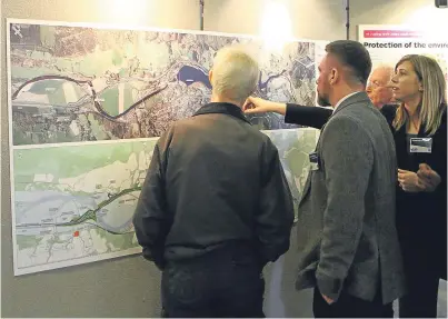  ?? Picture: Dougie Nicolson. ?? Members of the public had a look at plans for the stretch between Pitlochry and Killiecran­kie at an exhibition in Pitlochry Town Hall yesterday.