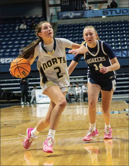  ?? ?? North Kingstown’s Maya Bigelli drives past Moses Brown’s Marielle Nassiff during Saturday’s game at The Ryan Center.