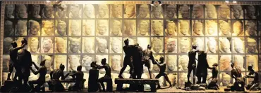  ??  ?? CRAFTSMANS­HIP: Statues depicting the creation of the Terracotta Army, with men assembling and painting the soldiers.