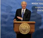  ?? (Arkansas DemocratGa­zette/Staton Breidentha­l) ?? Gov. Asa Hutchinson speaks Tuesday, March 2, at the state Capitol in Little Rock during his weekly COVID update press conference.