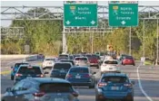  ?? SUN SENTINEL
JOHN MCCALL/SOUTH FLORIDA ?? Traffic along the Glades Road interchang­e of the Turnpike in Boca Raton on Feb. 25. Auto insurance experts say South Florida drivers pay far more for insurance because of road congestion, more crashes, defrauding of insurance companies, and 1 in 5 Florida drivers maintain no insurance at all, which drives up prices for everyone.