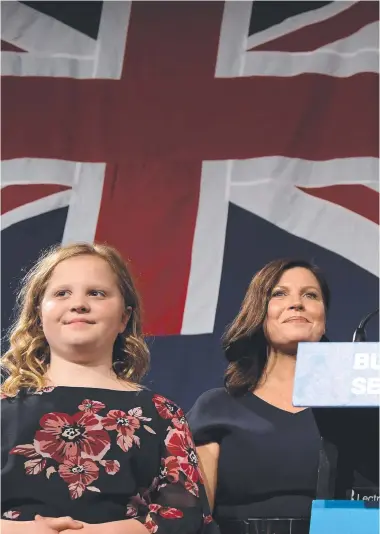  ??  ?? Prime Minister Scott Morrison, flanked by his wife Jenny Morrison and daughters Lily Morrison and