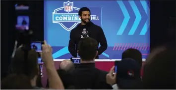  ?? MICHAEL CONROY — THE ASSOCIATED PRESS ?? USC quarterbac­k Caleb Williams, the expected No. 1overall draft pick, speaks Friday at the NFL scouting combine.