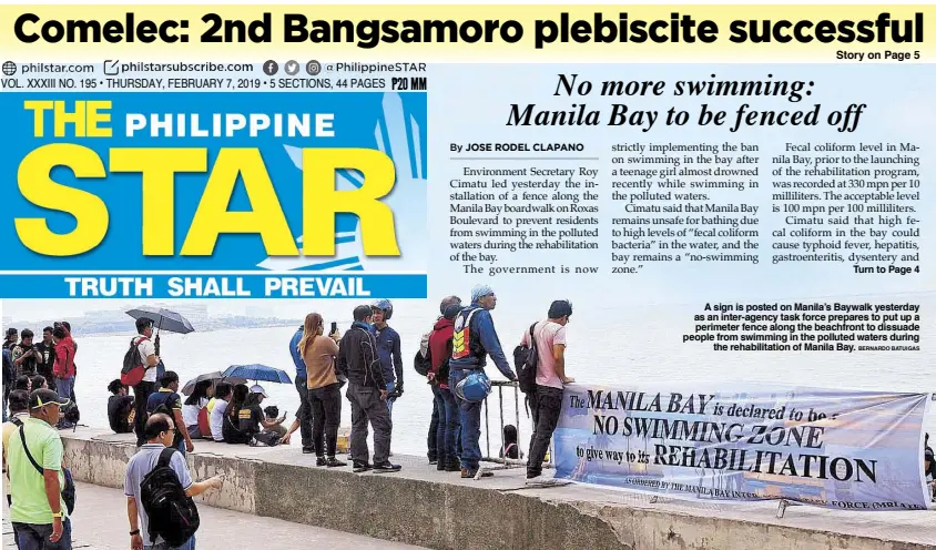  ?? BERNARDO BATUIGAS ?? A sign is posted on Manila’s Baywalk yesterday as an inter-agency task force prepares to put up a perimeter fence along the beachfront to dissuade people from swimming in the polluted waters during the rehabilita­tion of Manila Bay.