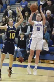  ??  ?? Saratoga Springs senior Kerry Flaherty gets her jump shot off as Averill Park defender Anna Jankovic closes in duirng the second half of Friday’s Suburban Council match-up at Saratoga Springs High School.