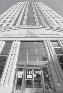  ?? Steve Gonzales / Houston Chronicle file ?? Hurricane Harvey shuttered the Harris County Criminal Courthouse at 1201 Franklin, as did Tropical Storm Allison. Consultant­s are studying what to do with the structure.