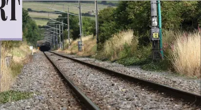  ??  ?? Commuter route: the railway entering the tunnel at Bray Head.