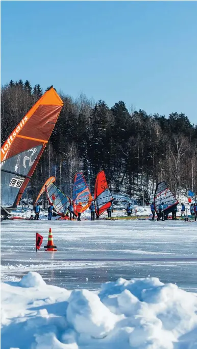  ?? TUUKKA LUUKKONEN ?? With a dizzying array of turns, the critical skill in slalom racing is getting around the marks. The goal is a smooth and arcing jibe, completed without stalling the sail. PHOTO :