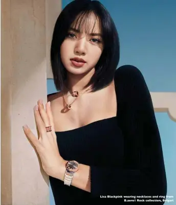  ??  ?? Lisa Blackpink wearing necklaces and ring Jrom B.zero1 Rock collection, Bvlgari