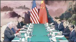  ?? AFP ?? US Secretary of State Rex Tillerson (left) meets with Chinese Foreign Minister Wang Yi (right) and other Chinese leaders at the Great Hall of the People in Beijing yesterday.