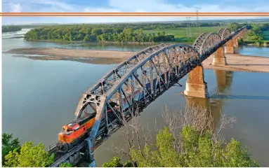  ?? Roy Inman ?? When the double-track project in Kansas is complete, just two short single-track segments will remain on the 2,200-mile Chicago-LA route: this bridge at Sibley, Mo., shown on Aug. 22, 2021, and another bridge in Oklahoma.