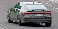  ??  ?? SPIED ON TRACK Spies caught the RS 7 testing at the Nürburgrin­g, and lower ride height of potent new car is clearly visible