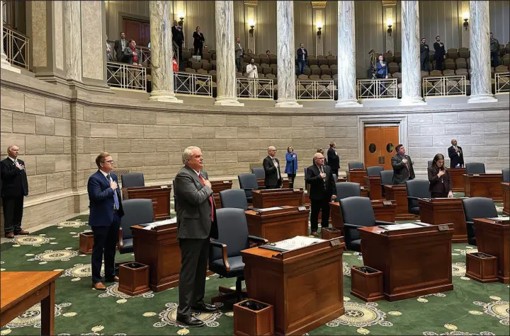  ?? DAVID A. LIEB / ASSOCIATED PRESS ?? Members of the Missouri Senate recite the Pledge of Allegiance as the chamber convenes its annual session Jan. 3 in Jefferson City, Mo. Disagreeme­nts over abortion rights, gun control and treatment of racial minorities are just some of the issues that have caused several political leaders to say they can’t take an oath or recite the pledge. Some Republican­s point to amendments enshrining abortion rights in state constituti­ons. Ohio’s protection­s passed last fall, and advocates are proposing an initiative for the Missouri ballot this year.