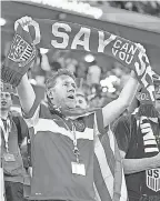  ?? DANIELLE PARHIZKARA­N/ USA TODAY SPORTS ?? U. S. fans cheer during the first half Monday at Ahmed Bin Ali Stadium.