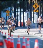  ?? (TNS) ?? PEOPLE EXERCISE in Fort Lauderdale, Florida, earlier this month. ‘If we can establish a new routine, then we can arrest that weight gain and try and maintain a normal weight,’ says Dr. Donald Hensrud of the Mayo Clinic.