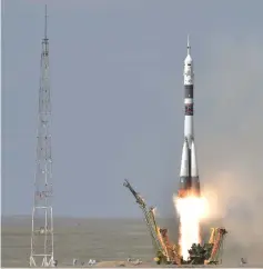  ??  ?? Russia’s Soyuz MS-09 spacecraft carrying the members of the Internatio­nal Space Station (ISS) expedition 56/57, blasts off to the ISS from the launch pad at the Russian-leased Baikonur cosmodrome. — AFP photo