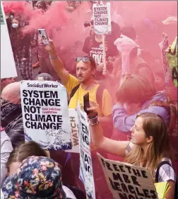  ??  ?? CLASH: XR-linked protesters target Smithfield meat market yesterday