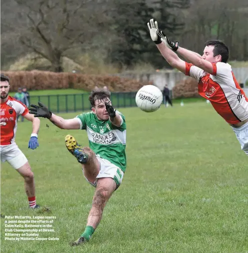  ??  ?? Peter McCarthy, Legion scores a point despite the efforts of Colm Kelly, Rathmore in the Club Championsh­ip at Direen, Killarney on Sunday
Photo by Michelle Cooper Galvin