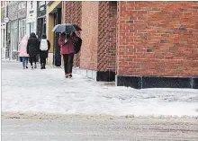  ?? JULIE JOCSAK
THE ST. CATHARINES STANDARD ?? Rain, freezing rain, snow — we’re getting it all.