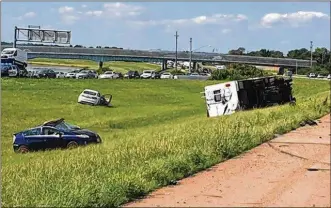  ?? SEAN CUDAHY / STAFF ?? A fatal crash shut down part of northbound Interstate 75 on Saturday afternoon.